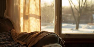 Cozy winter afternoon with sunlight streaming through the window in a warm interior photo