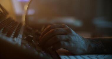 Man adjusting sound while composing music in studio video