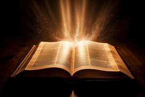 open book with glowing pages and sparks photo