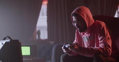 Challenging man playing videogame in cafe video