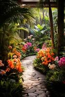 Lush tropical garden pathway with vibrant flowers and foliage photo