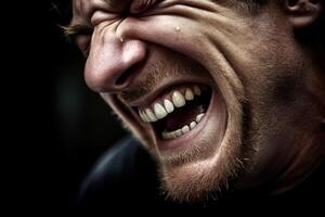 Intense facial expression of a man with a beard photo