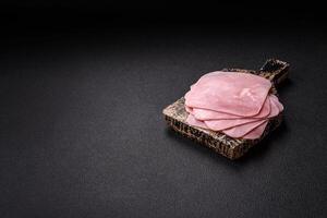 Ham cut into square slices for making delicious nutritious sandwiches photo