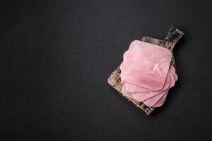 Ham cut into square slices for making delicious nutritious sandwiches photo