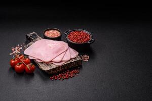 Ham cut into square slices for making delicious nutritious sandwiches photo