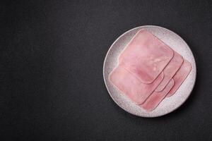 Ham cut into square slices for making delicious nutritious sandwiches photo