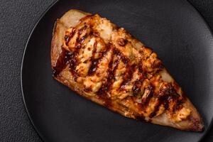 Grilled mackerel fillets with cheese, salt, spices and herbs photo
