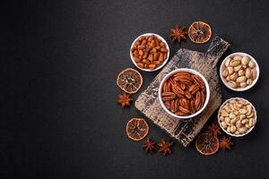 Delicious nutritious pecan nuts in ceramic bowl photo