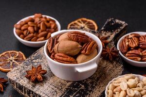 Delicious nutritious pecan nuts in ceramic bowl photo