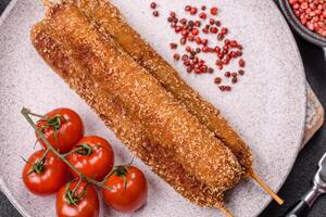 Lula kebab meat fried on a fire in breading with salt, spices and herbs photo