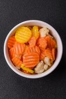 Delicious fresh vegetables steamed carrots, broccoli, cauliflower photo