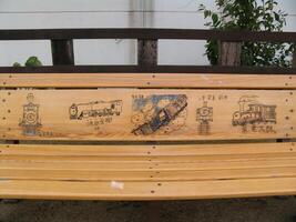 wooden bench in Japan, a painted back of a bench. photo