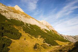 Landscape with mountains and clouds in the Austrian Alps, Tyrol photo