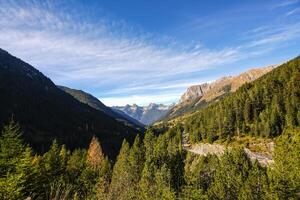 Blue sky with a few clouds in the Austrian Alps, Tyrol photo