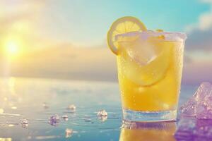 A glass of lemonade with ice and a slice of lemon photo