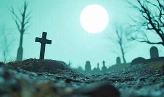 A graveyard with a cross in the middle of it photo
