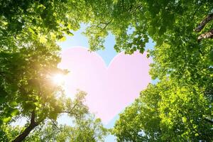 A heart-shaped design framed by vibrant green trees and sunlight. photo