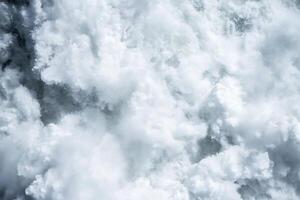 A close-up view of turbulent ocean waves and foam. photo