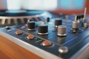 Close-up of a vintage audio mixer with knobs and buttons. photo
