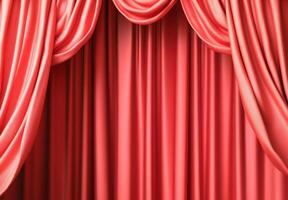 A pair of elegant red curtains draped for a theatrical presentation. photo