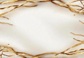 A decorative background featuring elegant golden branches on a light surface. photo