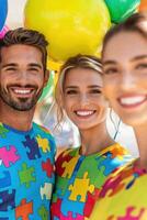 Smiling volunteers at an autism awareness fundraiser wearing colorful puzzle pattern shirts and holding vibrant balloons in a joyful outdoor setting photo