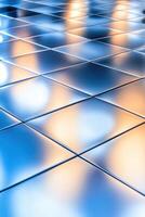 Glossy black ceramic tile illuminated by gradient light creates a modern minimalist atmosphere in an elegant setting photo
