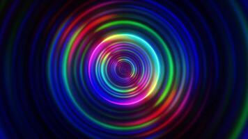A colorful circular light is shown in the center of the image video
