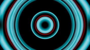 A blue and red circular pattern on a black background video