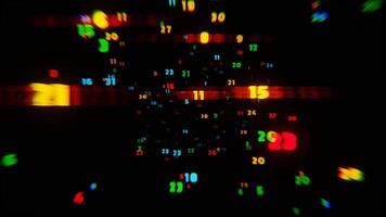 A colorful array of numbers is shown in a dark room video
