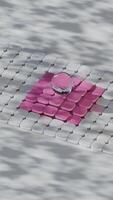 A pink square on a tile floor video