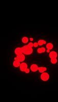 A red circle with many red dots on it video