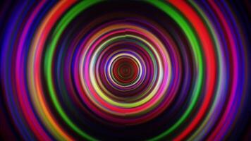 A colorful circular light pattern in the dark video