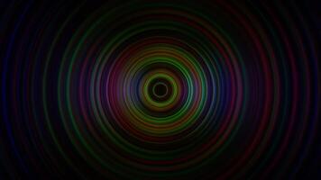A colorful circular background with a black background video