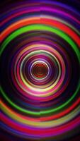 Colorful circular motion background with a black background video