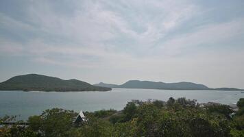 A view of the ocean from a hill overlooking the water video