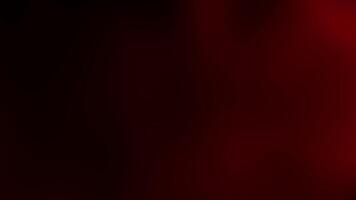 Abstract background with dark red and black gradient. Suitable for designs needing a dramatic or mysterious feel, such as posters or social media graphics. video