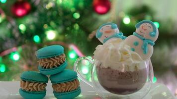 Coffee with foam in glasses and macarons. Romantic breakfast for two coffee and macaroons. video