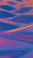 A colorful abstract image of waves on a blue and orange background video