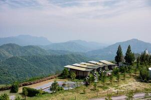 Scenery of Iconic resort with statue buddha on hill in Wat Pha Sorn Kaew at Khao Kho photo