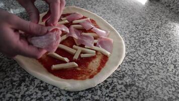 Pizza chef adding ham video