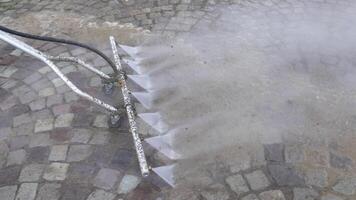 Professional cleaning cobblestone pavement video