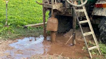 A tractor with a bucket on top of it photo