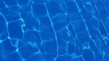 Water in the pool, sunlight is reflected, waves. Reflection and glare. Sun Glare in the Water in the Pool. video