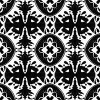a black and white pattern with a floral design vector