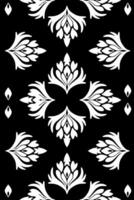 Seamless pattern in the style of baroque. White on a black background. illustration for elegant textile design. vector