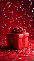 Valentines day concept. red gift box on red background with bright falling confetti. minimal style. video