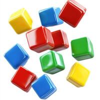 Colorful building blocks scattered on a white surface, perfect for imaginative play and learning activities photo