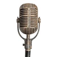 Vintage microphone with metallic details on white background photo