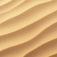 Close-up of golden sand dunes with smooth patterns photo